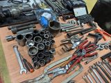 many different tools on the table together on the table