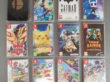 a lot of nintendo wii games on the table