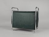 an image of a magazine rack with a green cover on it