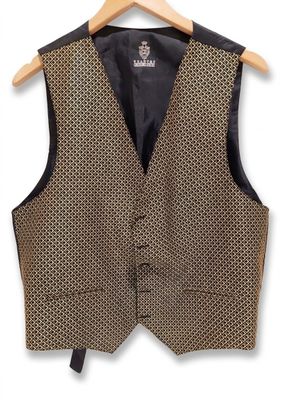 a close up of a vest on a hanger on a white background