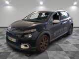 the car is parked in the garage on the checkered floor