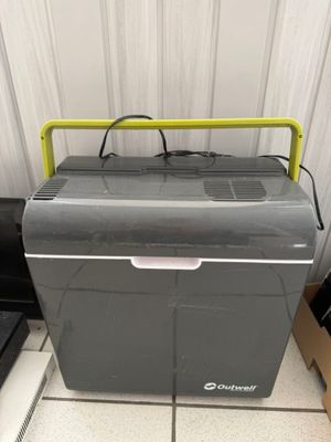 an image of a cooler sitting on top of a tiled floor