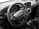 the interior of a car with a steering wheel, dashboard, and dash board