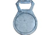 a metal bottle opener with a metal handle on a white background