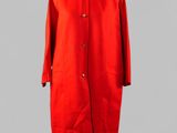 an image of a red coat on a mannequin stand