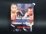a poster for a boxing match with two boxers