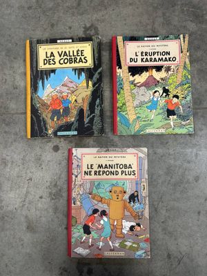 trois livres pour enfants posés les uns à côté des autres sur le sol