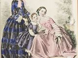 an old book with a picture of two women and a child