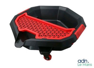 a close up of a black and red plastic bowl on a white background