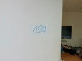 a picture of a room with a clock on the wall