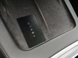 a close up of a car ' s dashboard with a remote control