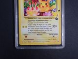 a pokemon card with a picture of a pikachu on it