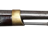 an old gun that has been used as a weapon