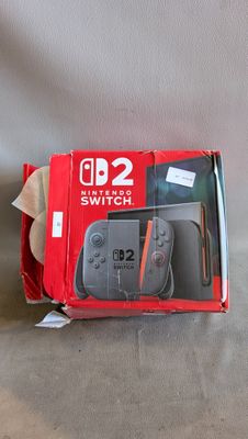 une boîte contenant une manette Nintendo Wii
