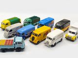 a lot of toy trucks that are lined up together