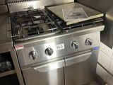 a stainless steel stove and oven in a kitchen