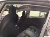 the back seats of a car are empty and the passenger seat is empty