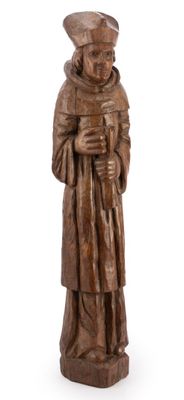 wooden statue of a man holding a book and a hat