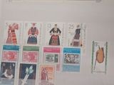 a picture of a postcard with a lot of stamps on it