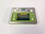 a green and silver electronic device on a white surface