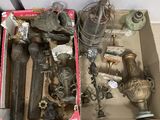 a box full of antique items sitting on the floor