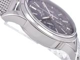 a close up of a watch on a white background