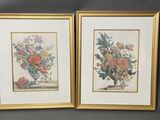 pair of two framed floral prints of flowers in a vase