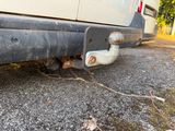 a close up of a truck with a flat tire