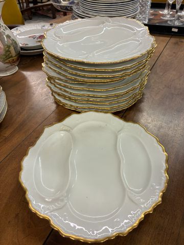12 assiettes à hors d’œuvre en porcelaine de Limoges R. BONHOMME 