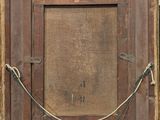 an old picture frame with a rope hanging from it ' s sides