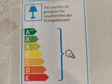 a label on the back of a plastic bag with a light bulb on it