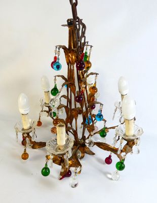 a chandelier that has a bunch of lights hanging from it