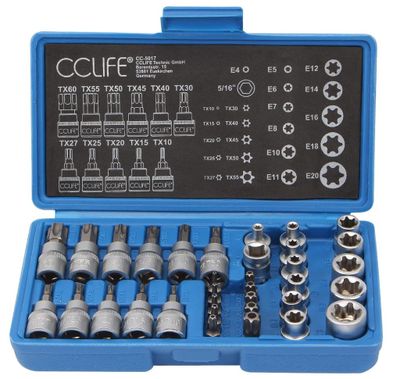 un ensemble de douilles dans un coffret bleu sur fond blanc