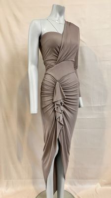 an image of a mannequin wearing a dress on a mannequin stand