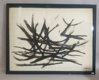 un tableau en noir et blanc accroché au mur d'une pièce