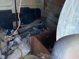an image of a van with a bunch of stuff in the back