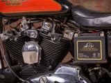 a close up of a motorcycle with a red and black engine