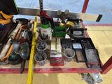 a table with tools on it and a measuring tape