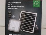 an image of a box with a solar powered flood light inside of it