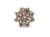 an image of a diamond cluster ring on a white background