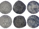 un lot de six pièces d'argent présentant des motifs différents