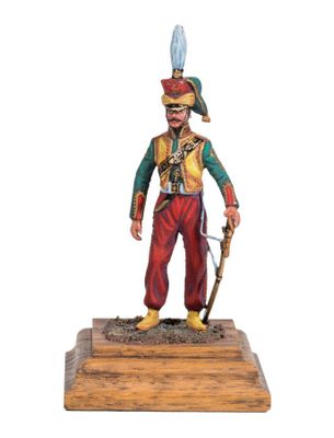 statue of a man in a uniform with a sword and a hat