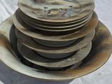 a lot of plates stacked on top of each other