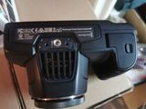 a camera that is sitting on top of a box