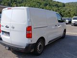 a white van that is parked in a parking lot