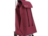 un gros plan d'un caddie sur lequel est posé un sac