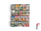 many mickey mouse books on display on the wall