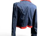 denim jacket on a mannequin stand with red trims