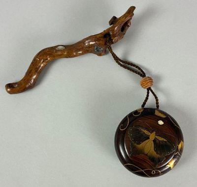 a small wooden object with a bird on it