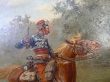 un tableau représentant un homme à cheval, un pistolet à la main